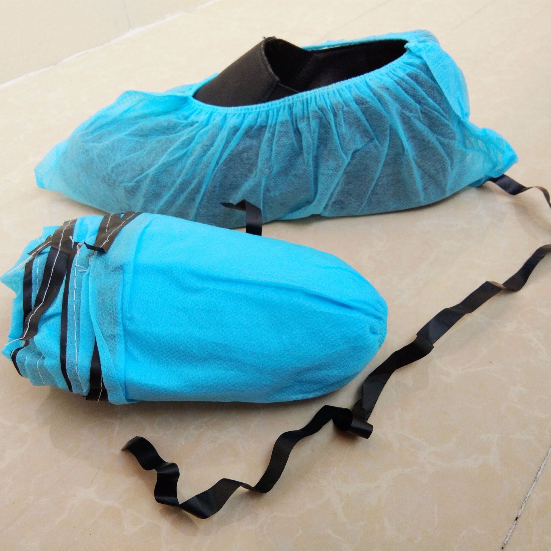 ESD NON WOVEN SHOES COVER.jpg ESD NON WOVEN SHOES COVER.jpg